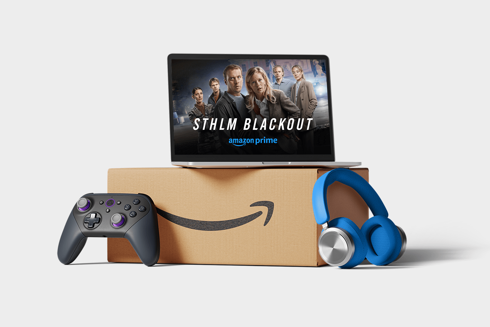 Bild på ett paket och runt det ligger det en gamingkontroll, hörlurar och padda som visar artwork för Stockholm Blackout. Få alla förmåner med Amazon Prime.